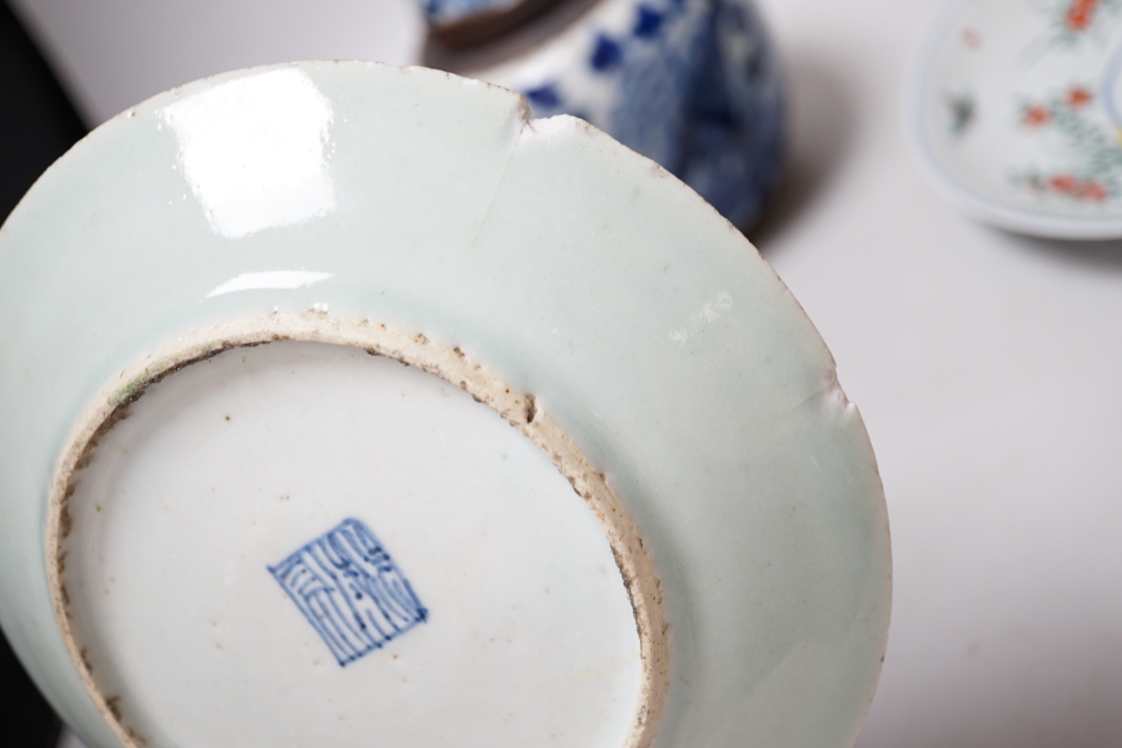 A Chinese famille rose plate, a cantonese plate and a blue and white crackle glaze jar